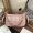 MCM Mini Delmy Crossbody in Visetos Light Pink